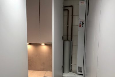 Electric boiler housed